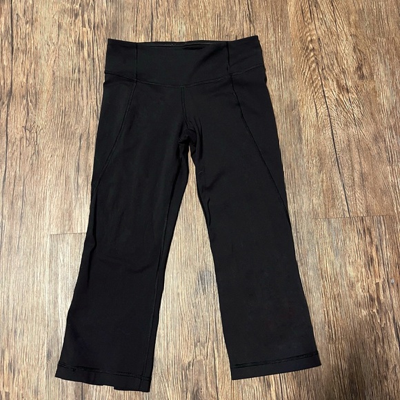 Lululemon, size 4, black, cropped leggings with split in back - Picture 1 of 2